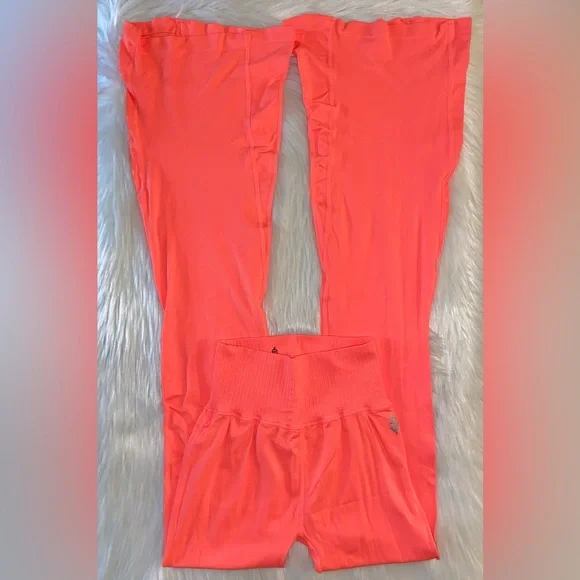21. New FP Movement Good Karma Leggings in Neon Coral - Picture 3 of 6